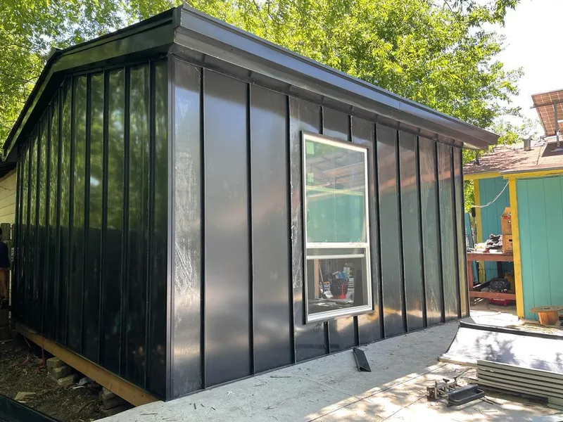 Black standing seam metal wall panels for Roof Inspection in Creston