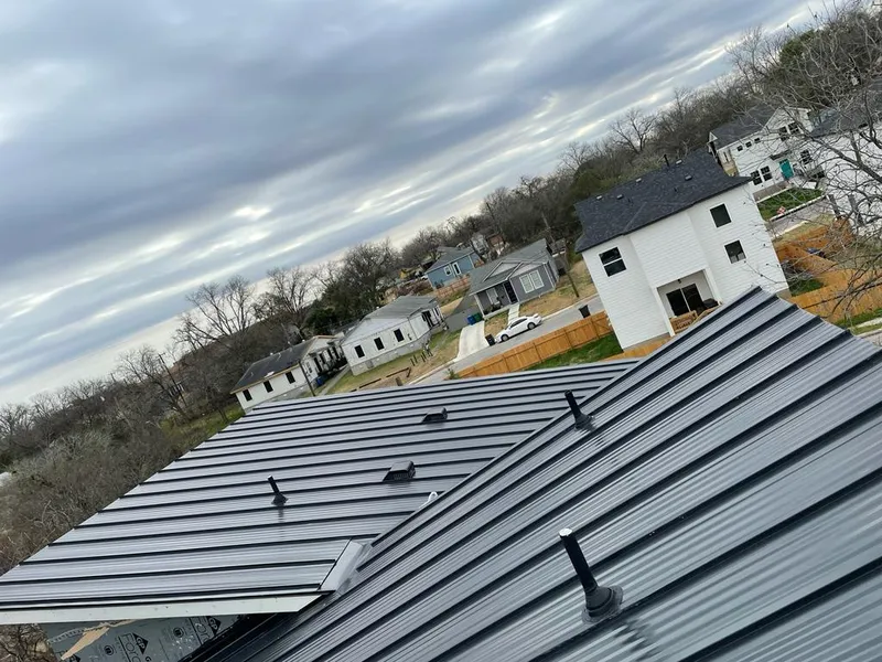 Standing seam metal roof panels with vents for Skylight Repair in Creston